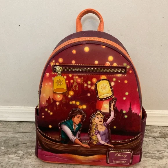 NwT Loungefly Tangled Rapunzel & Flynn Boat Scene Glow in the dark Mini Backpack - Picture 1 of 4